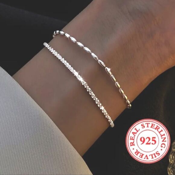 Elegant 925 sterling silver charm bracelet. - Picture 1 of 9